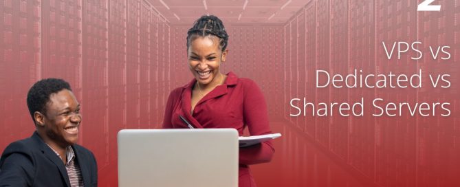 Two professionals discussing hosting solutions on a laptop with a server room background, highlighting VPS vs Dedicated vs Shared Servers.
